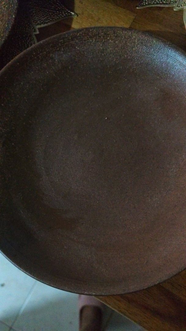Rustic Ceramic Plate with Speckled Glaze (Category: Dinnerware & Cutlery) located in Manila. Submitted by marriage031073advocate (Listing ID 1464441238, Image 2). Description: - Earthy toned ceramic plate - Speckled glaze with a darker rim - Light, matte finish inside - Subtle concentric circle detail on the interior - Versatile: great for serving food or as a decorative piece - Unique, handmade aesthetic - Set of 6 plates + 1 extra .