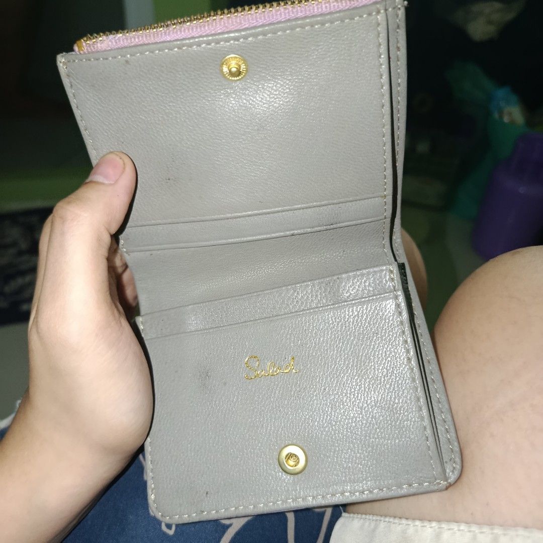 Salad Purple Leather Tri-fold Wallet (Category: Wallets & Card holders) located in Manila. Submitted by daphnefinds (Listing ID 1464535116, Image 2). Description: - Salad purple tri-fold wallet - Features gold hardware with logo detail - Zipper is functional - Suitable for everyday use -matigas zipper need wash din.