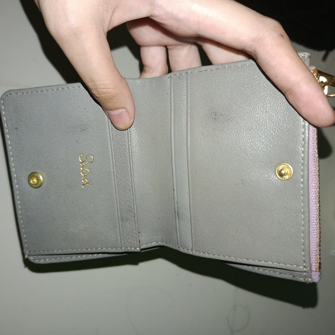Salad Purple Leather Tri-fold Wallet (Category: Wallets & Card holders) located in Manila. Submitted by daphnefinds1 (Listing ID 1464560265, Image 3). Description: - Salad purple tri-fold wallet - Features gold hardware with logo detail - Zipper is functional - Suitable for everyday use.