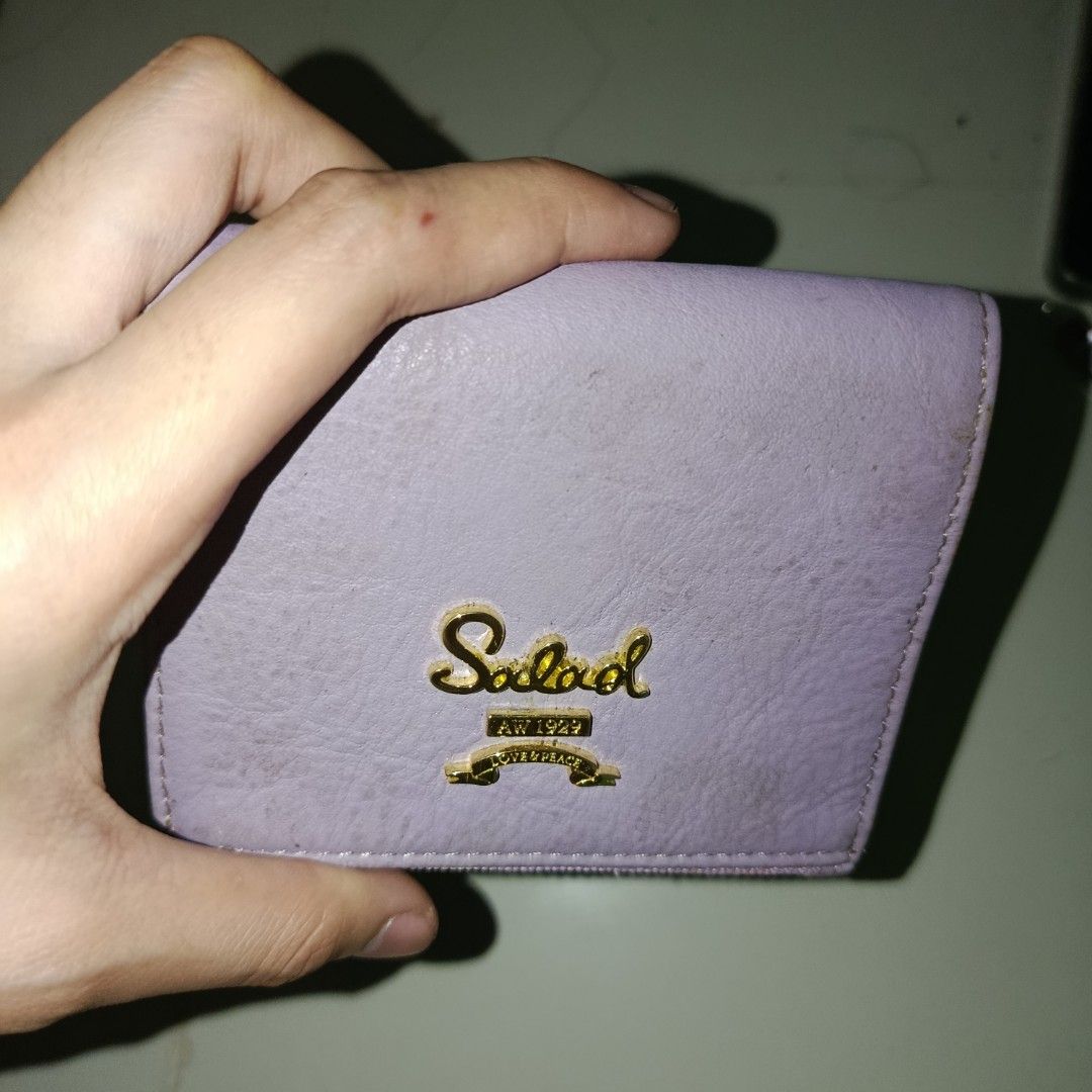 Salad Purple Leather Tri-fold Wallet (Category: Wallets & Card holders) located in Manila. Submitted by daphnefinds1 (Listing ID 1464560265, Image 2). Description: - Salad purple tri-fold wallet - Features gold hardware with logo detail - Zipper is functional - Suitable for everyday use.