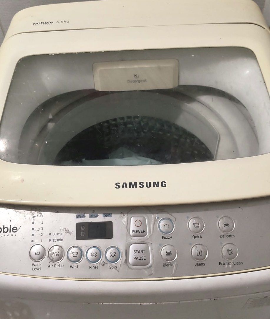 SAMSUNG WOBBLE TECH WASHING MACHINE (Category: Washing Machines and Dryers) located in Pasig City. Submitted by ischelle.16 (Listing ID 1464469879, Image 1). Description: Issue: water pump not working and nag short outlet. Selling as-is / for repair or parts. Pick-up: Kapasigan, Pasig PM .