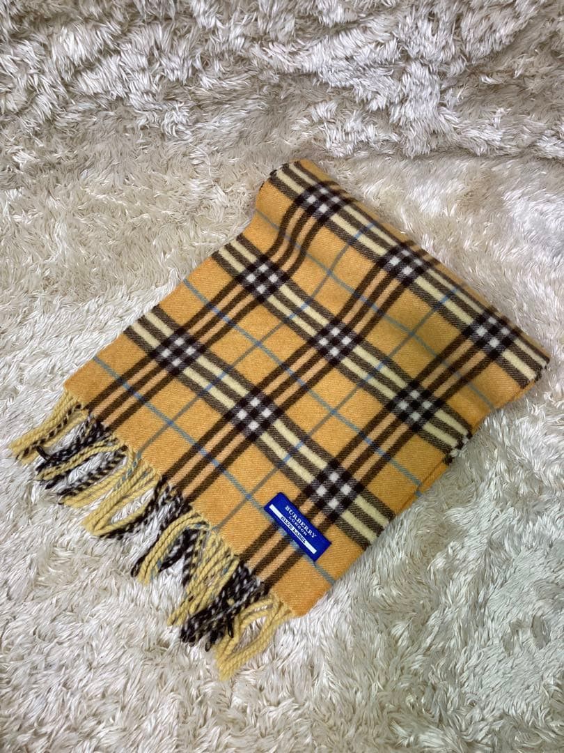 SCARFACE BURBERRY (Category: Luxury Accessories) located in Manila. Submitted by icamalicdem29 (Listing ID 1464385007, Image 2). Description: Vintage Burberry London Lambswool Scarf, Classic Plaid Check Beige Tan Neckwear, Made in England Luxury Winter Muffler, Authentic Unisex Genuine Burberry Lambswool scarf size 167cm or 64 inches Excellent condition.