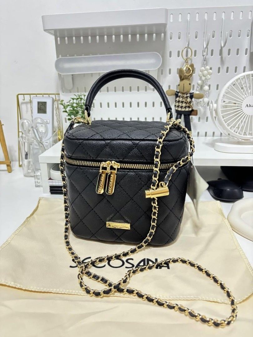 Secosana Black Quilted Vanity Case Bag (Category: Luxury Bags & Wallets) located in Tanza. Submitted by yelacii (Listing ID 1464418202, Image 1). Description: 2x lang nagamit. Bagong bago pa. With dust bag Nakatago lang. 1.5k ko nabili 1k nalang.