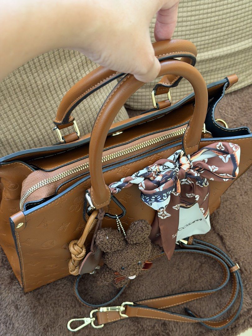 SECOSANA TOP HANDLE HANDBAG WITH SLING (Category: Tote Bags) located in Lucena. Submitted by alvic27 (Listing ID 1464389878, Image 2). Description: Used only once during event. Almost brand new. Bear charm not included..