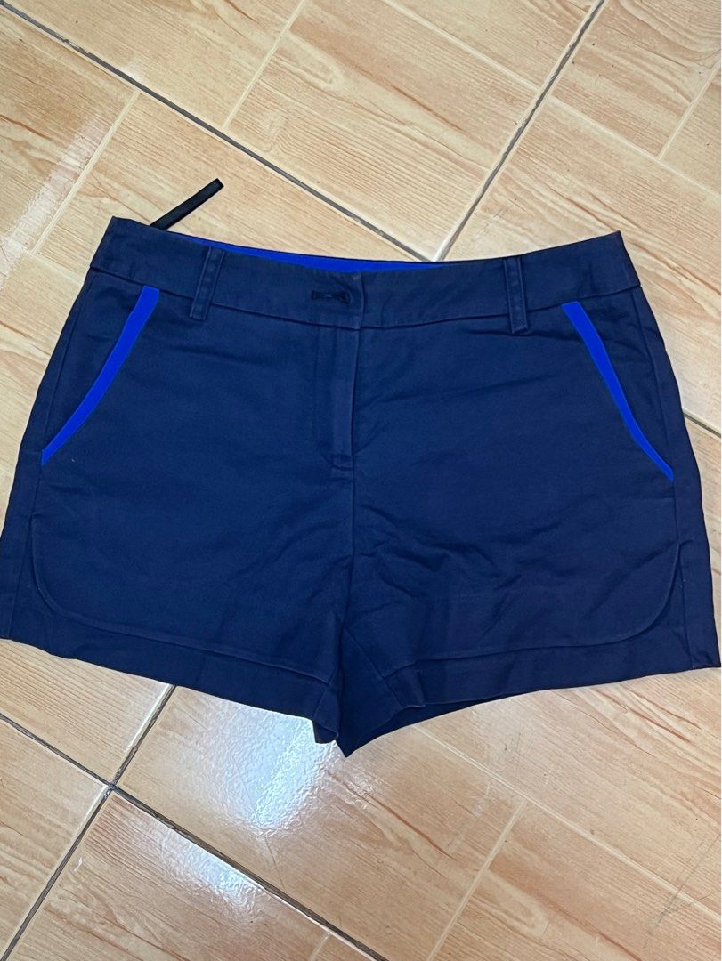 SEIFINI Navy Blue Shorts Size S (Category: Shorts) located in Marikina City. Submitted by julmograsell (Listing ID 1464486977, Image 1). Description: - Brand: SEIFINI - Color: Navy Blue - Size: S - Accent: Bright blue on sides - Pockets: Two at the back - Closure: Button and zip at the front - Style: Great for casual wear.