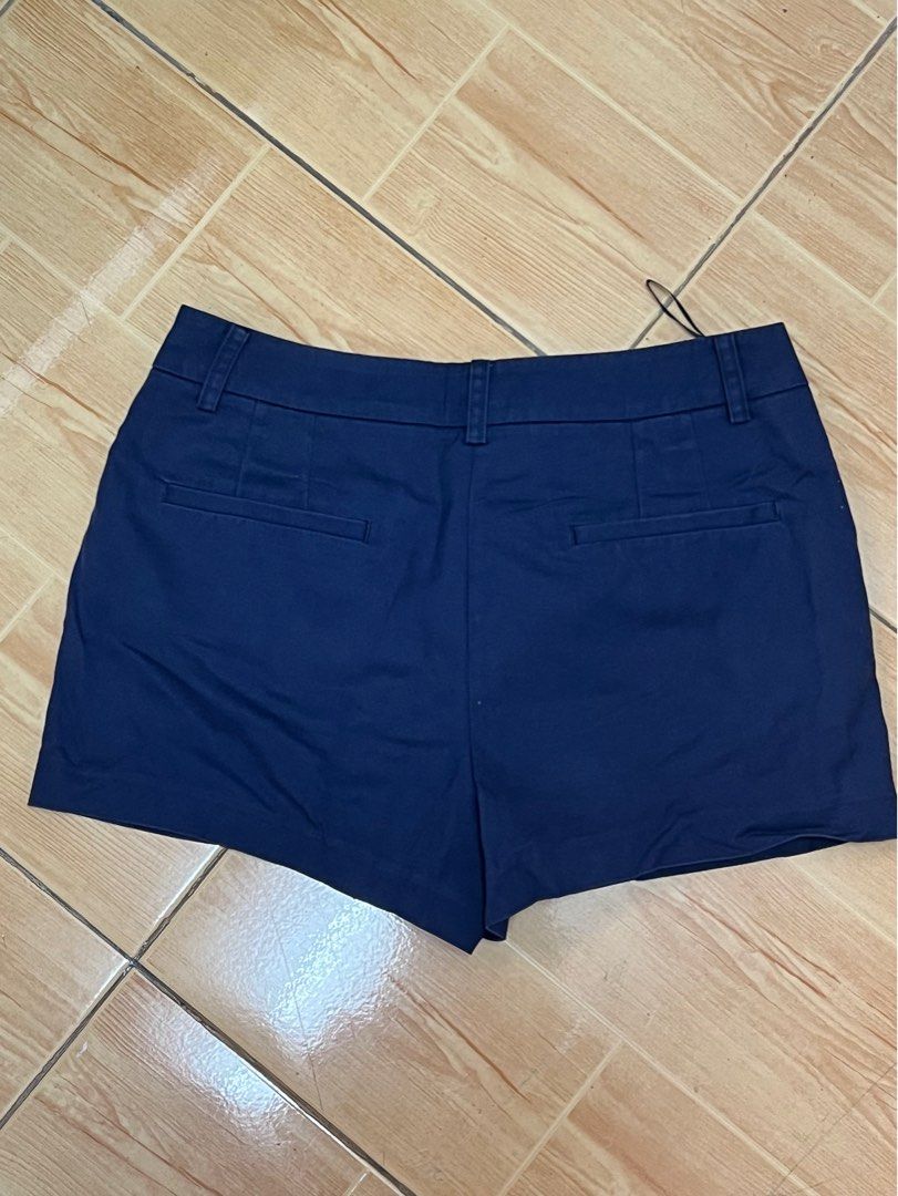 SEIFINI Navy Blue Shorts Size S (Category: Shorts) located in Marikina City. Submitted by julmograsell (Listing ID 1464486977, Image 2). Description: - Brand: SEIFINI - Color: Navy Blue - Size: S - Accent: Bright blue on sides - Pockets: Two at the back - Closure: Button and zip at the front - Style: Great for casual wear.