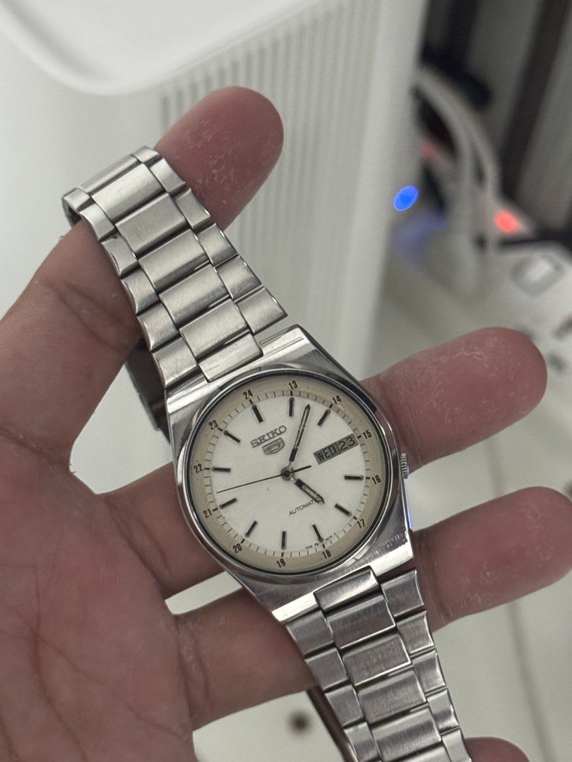 Seiko 5 Automatic Military white dial (Category: Men's Watches) located in Manila. Submitted by frierin (Listing ID 1464397397, Image 1). Description: - Classic Seiko 5 Automatic Watch - White Dial with Day and Date Function - Durable Stainless Steel Bracelet - Reliable Automatic Movement - Water Resistant - Ideal for Everyday Wear - Selling to downsize my collection.