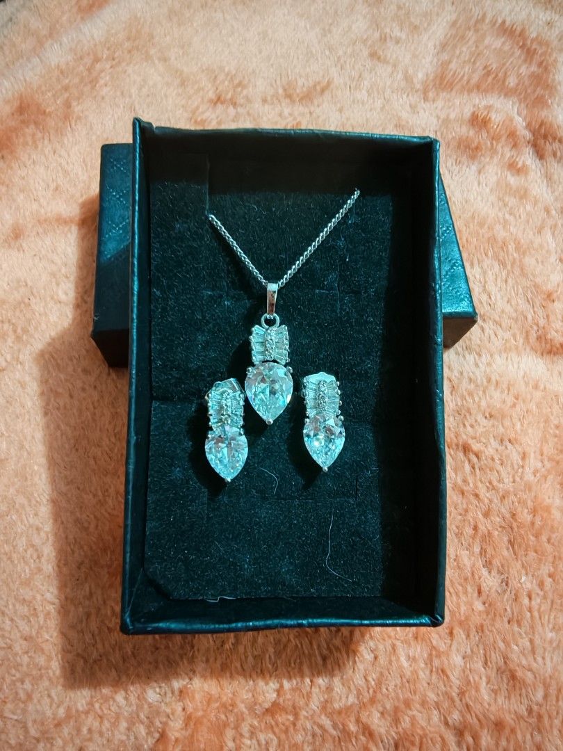 Set earring necklace HQ stainless (Category: Necklaces) located in Taguig. Submitted by voxsummer88 (Listing ID 1464437059, Image 2). Description: set earrings and necklace. high quality stainless 18" necklace chain.