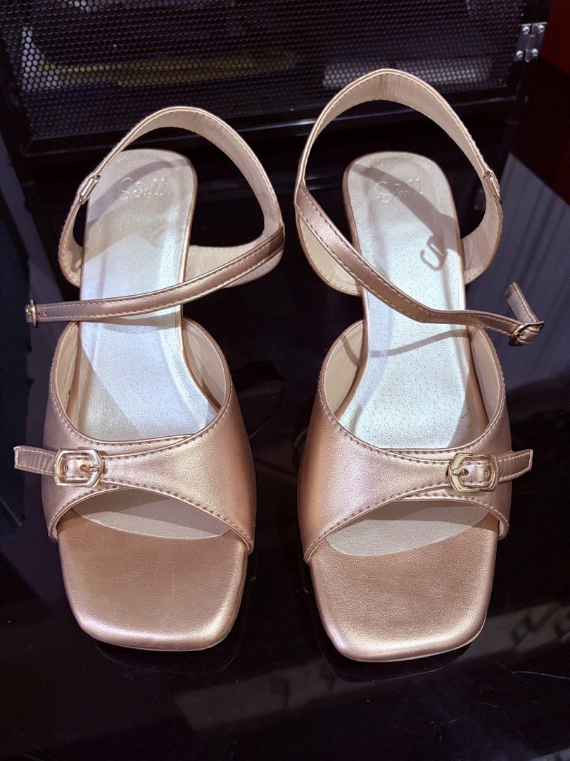S&H Copper Strappy Heels SIZE 39 (Category: Heels) located in Manila. Submitted by annielouu (Listing ID 1464497851, Image 2). Description: - Brand: S&H -Size: 39 - Color: Copper - Style: Strappy heels - Closure: Buckle - Toe: Square - Heel Height: Approx. 2-3 inches - Includes: Original box Condition: NEVER been worn before, brand new. RFS: Impulsively bought it. Heels are too tall for my liking..