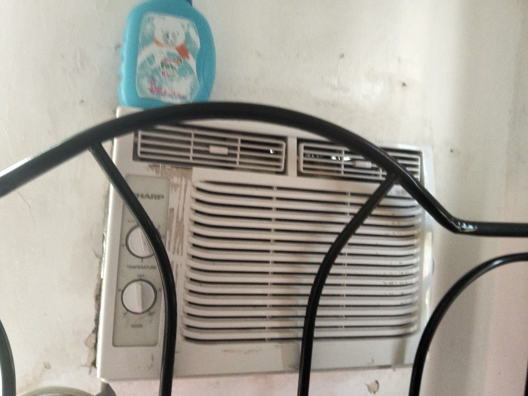 Sharp Window Air Conditioner (Category: Air Conditioning and Heating) located in Taguig. Submitted by bec2020 (Listing ID 1464367576, Image 1). Description: Window air conditioner by Sharp. Has temperature and mode dials. Power cord is coiled and secured with tape. .