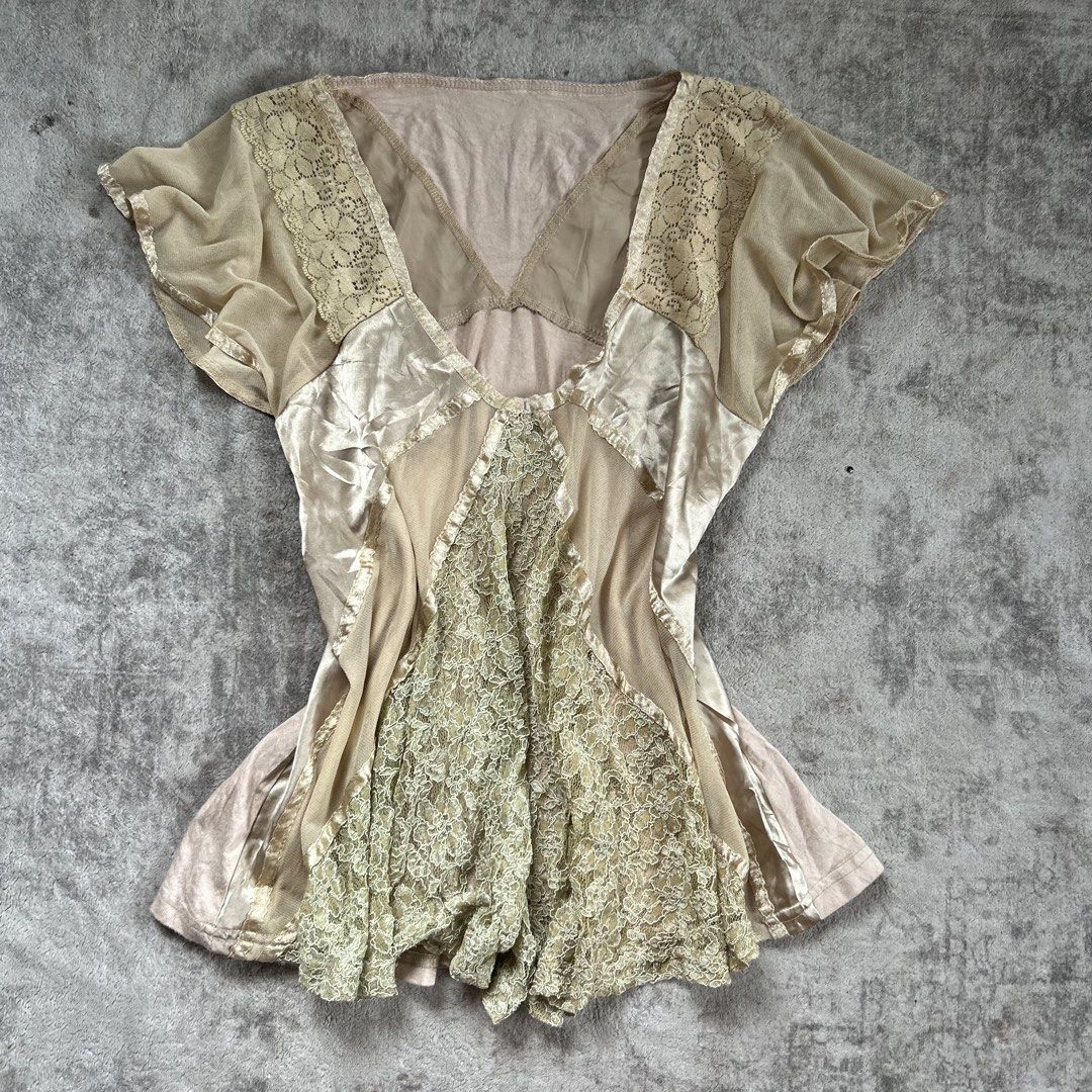 Sheer Lace & Satin Patchwork V-Neck Top fairycore whimsy (Category: Blouses) located in Davao. Submitted by read_my_abouts (Listing ID 1464465543, Image 1). Description: - size s-m Sheer mesh and satin patchwork top - Delicate lace inserts on front and sleeves - V-neckline - Fluttery short sleeves - Unique mix of textures - Great for layering or as a statement piece.
