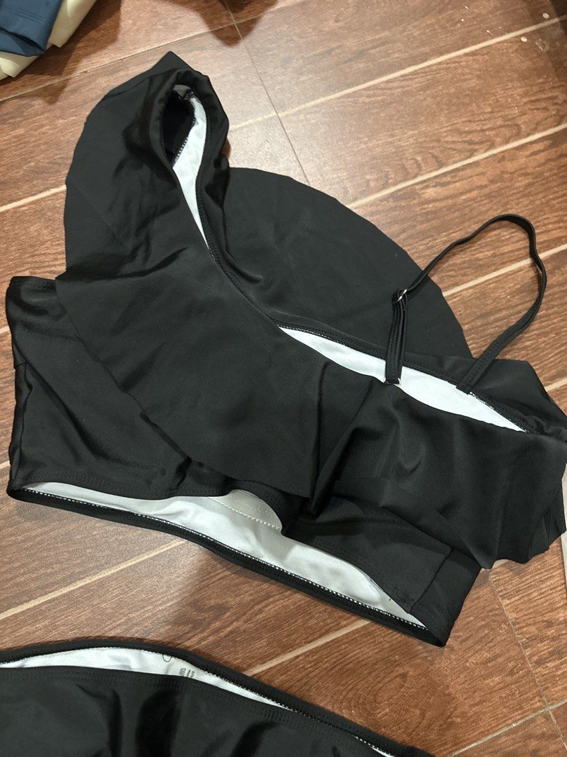 SHEIN Black One Shoulder Ruffle Bikini Set (Category: Bikinis & Swimsuits) located in Marikina City. Submitted by rctoby00 (Listing ID 1464443163, Image 3). Description: - SHEIN black one-shoulder bikini set - Features a ruffled top - High-waisted bottoms - Smooth and stretchy material - Adjustable strap on the top for a perfect fit - Ideal for beach or pool outings - Please check the size chart for accurate measurements.