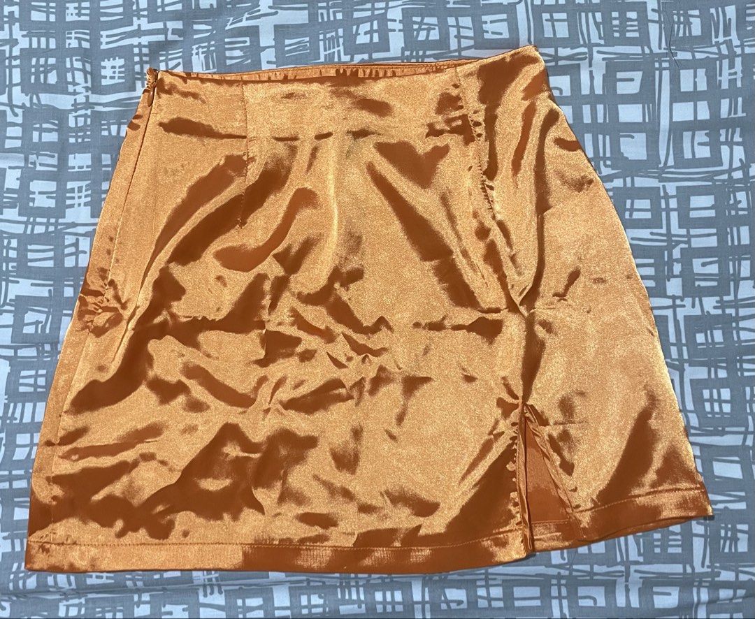 Shein Bright Orange Satin Skirt (Category: Skirts) located in Paranaque City. Submitted by preloveeed890 (Listing ID 1464378904, Image 1). Description: brand new, only fitted and kept in storage .
