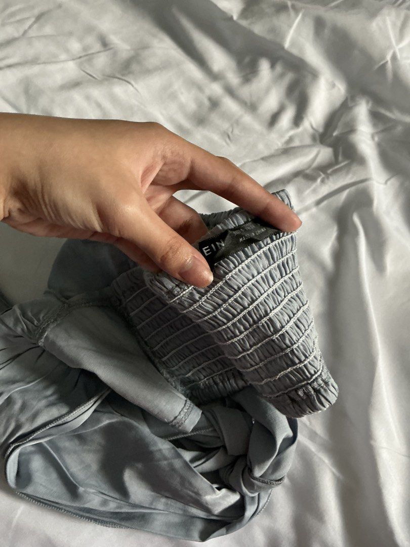 SHEIN Grey Smocked Halter Neck Crop Top (Category: Sleeveless) located in Manila. Submitted by isomarizm (Listing ID 1464400844, Image 3). Description: - Features a smocked bust for a flattering fit - Adjustable tie-back closure -Cropped loc: qc/malabon mop: gcash/maya.