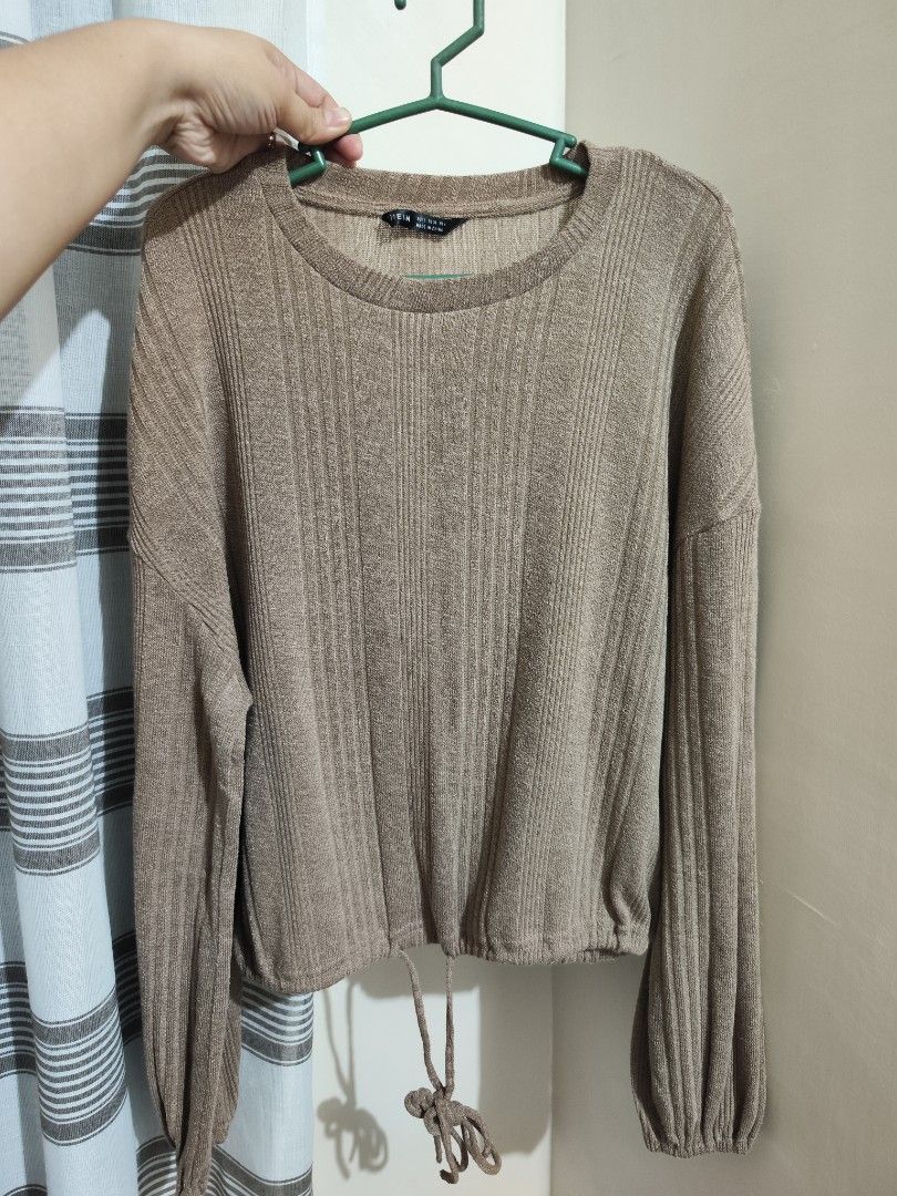 SHEIN Ribbed Knit Drawstring Cropped Sweater (Category: Longsleeves) located in Cavite. Submitted by isodanna0811-97013 (Listing ID 1464447804, Image 1). Description: size (small on tag but can fit to Large) width- 42" length- 20" armhole- 16" color: brown brand: Shein no flaws, like new.