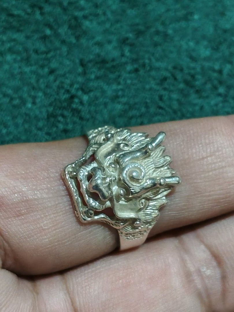 Silver Dragon Head Ring (Category: Rings) located in Cavite. Submitted by noblepenguin_6c8662 (Listing ID 1464527021, Image 2). Description: - Unique dragon head ring design - Made of genuine silver 925 - Adds an edgy touch to your style - Shows some signs of wear, but overall looks awesome - A true statement piece -size 12, 6.5g.