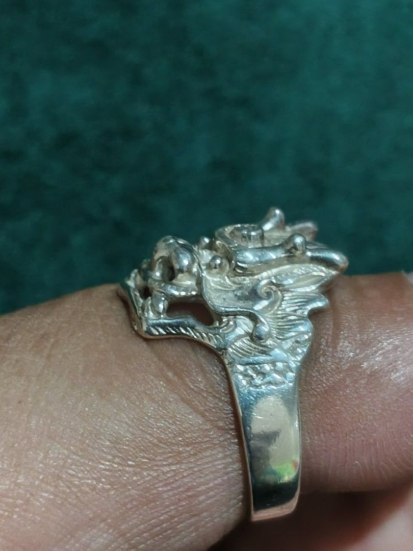 Silver Dragon Head Ring (Category: Rings) located in Cavite. Submitted by noblepenguin_6c8662 (Listing ID 1464527021, Image 3). Description: - Unique dragon head ring design - Made of genuine silver 925 - Adds an edgy touch to your style - Shows some signs of wear, but overall looks awesome - A true statement piece -size 12, 6.5g.