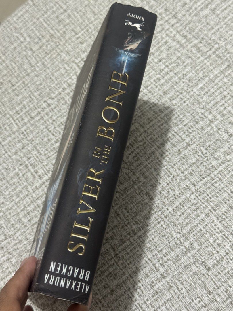 Silver in the Bone by Alexandra Bracken (Category: Storybooks) located in Cavite. Submitted by yourpahinagirly (Listing ID 1464464669, Image 2). Description: - Silver in the Bone by Alexandra Bracken - Hardcover edition - Published by Knopf - First book in a new fantasy series - Ideal for readers who love magic and adventure.