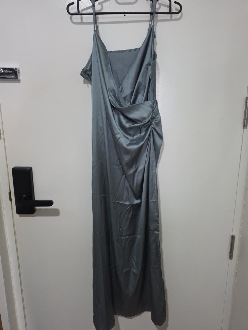 Solid Satin Slit Midi Dress (Category: Dresses) located in Santa Rosa. Submitted by marionette2728 (Listing ID 1464370972, Image 2). Description: ORIG PRICE: 1,220 - Elegant grey satin slip dress - Features a stylish twist front detail at the bust - Delicate spaghetti straps - Flattering midi length - Smooth and silky material for a luxurious feel - Ideal for a night out or special occasions.