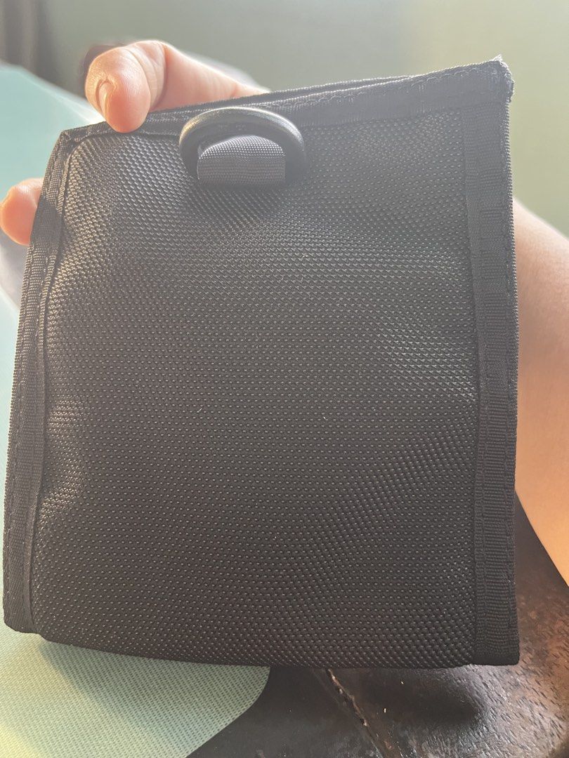 Solo-Tourist Passport Wallet (Category: Belt bags, Clutches and Pouches) located in Pasay City. Submitted by beye01 (Listing ID 1464437714, Image 2). Description: The lidded pocket on the front fits your passport perfectly. There are three pockets on the inside: two open pockets large enough to hold A4 folded in three, and one zippered pocket large enough to hold bills. There are also three card pockets and one zippered mesh pocket. Behind these 