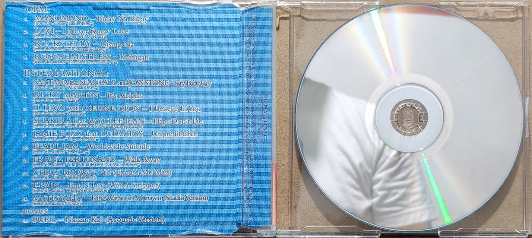 Sony BMG Sampler 2006 Volume 03 CD (Category: CDs & DVDs) located in Manila. Submitted by ruelcabrer77078 (Listing ID 1464556208, Image 2). Description: - Sony BMG Music Entertainment Sampler 2006 Volume 03 CD - Features OPM hits and international tracks - Includes songs by Mano Mano, Reggae Mistress, Santana, Ricky Martin, and more - Comes with bonus tracks - A fantastic music collection from 2006.