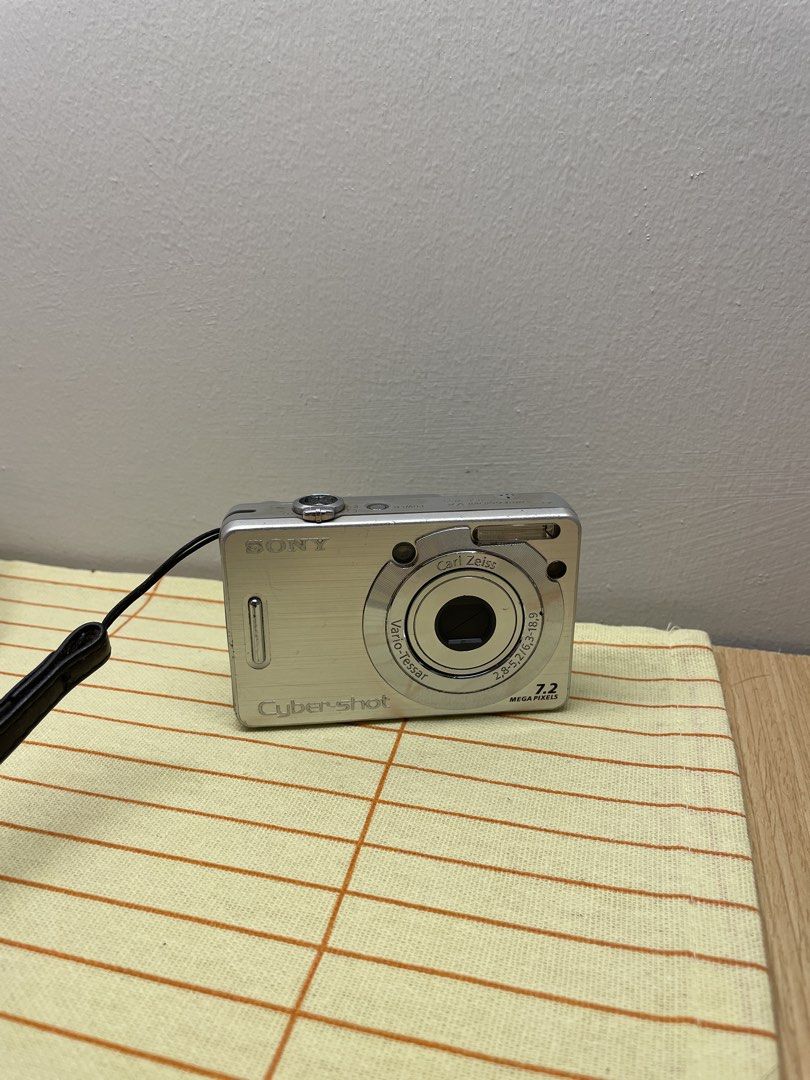 Sony Cyber-shot 7.2 Megapixels Digital Camera with Battery (Category: Cameras) located in Manila. Submitted by kindachic (Listing ID 1464568857, Image 1). Description: - Silver Sony Cyber-shot digital camera - 7.2 Megapixels resolution - High-quality Carl Zeiss lens - Includes original Sony NP-BG1 battery - Compact and easy to carry - Ideal for casual photography - Perfect for travel and everyday adventures.