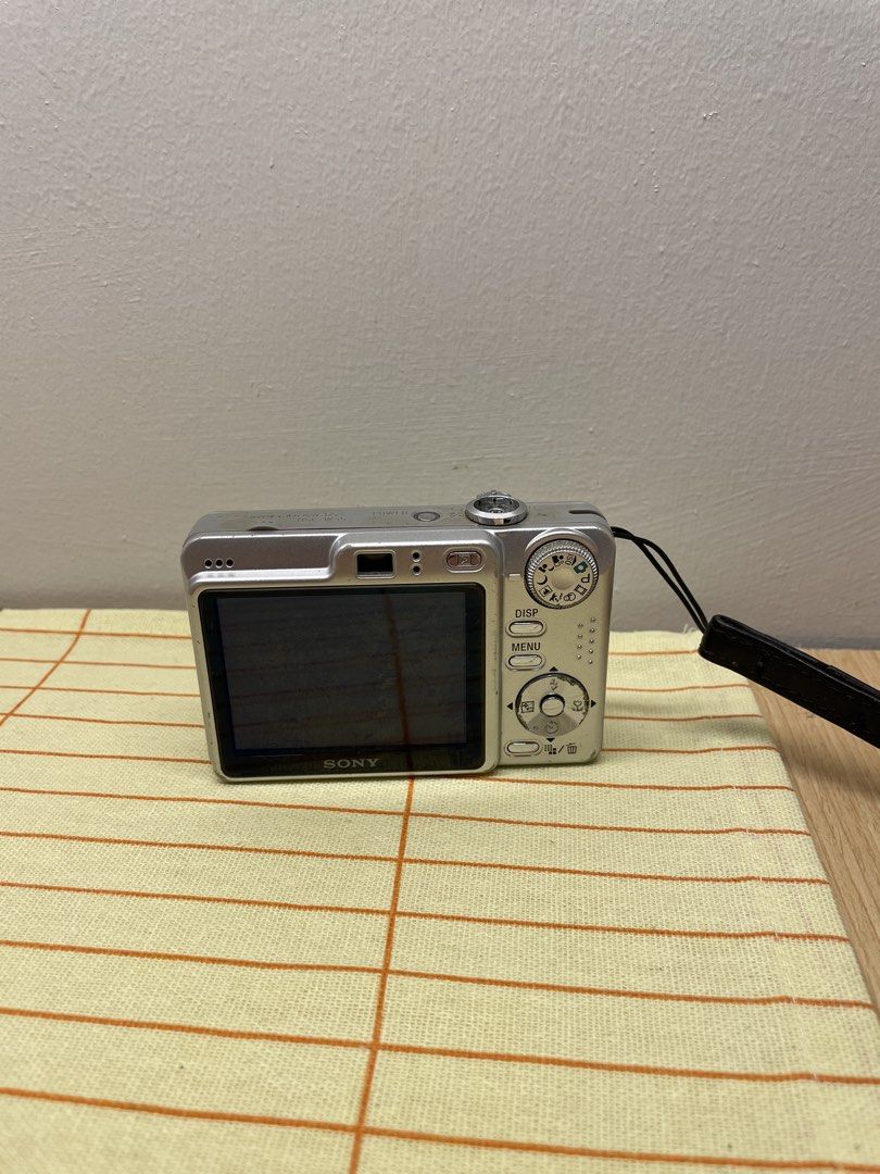 Sony Cyber-shot 7.2 Megapixels Digital Camera with Battery (Category: Cameras) located in Manila. Submitted by kindachic (Listing ID 1464568857, Image 2). Description: - Silver Sony Cyber-shot digital camera - 7.2 Megapixels resolution - High-quality Carl Zeiss lens - Includes original Sony NP-BG1 battery - Compact and easy to carry - Ideal for casual photography - Perfect for travel and everyday adventures.