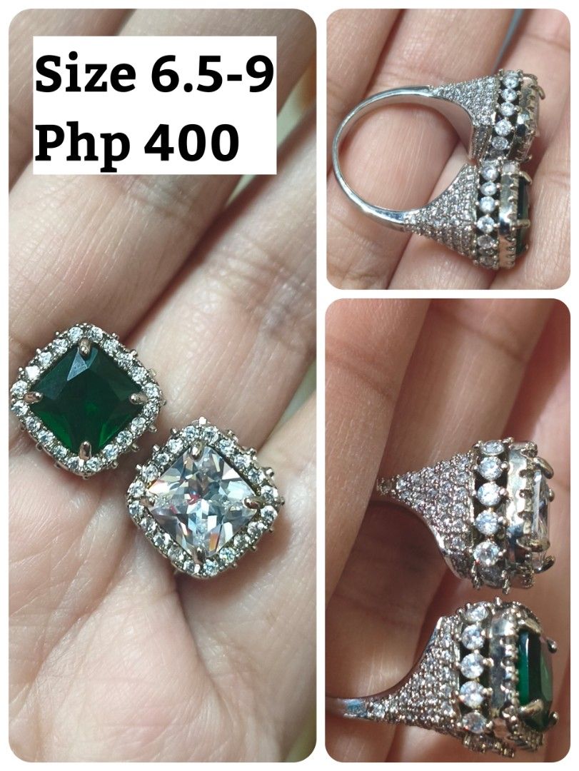 Sparkling Square Cut Ring with Emerald and Diamond Accents (Category: Rings) located in Quezon City. Submitted by gemaicloset (Listing ID 1463220170, Image 2). Description: - Eye-catching ring with a large square-cut emerald and a clear square-cut stone. - Both main stones are surrounded by smaller sparkling accent stones. - The band is also beautifully encrusted with tiny gems. - Ideal for special occasions or as a statement accessory. - Adds a 