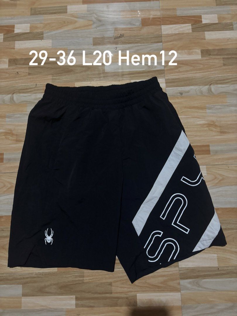 Spyder Black Athletic Shorts (Category: Shorts) located in Tubigon. Submitted by wawiesunbe75372 (Listing ID 1464458707, Image 1). Description: - Brand: Spyder - Type: Athletic Shorts - Color: Black - Size: Medium (M) - Features: Elastic waistband with drawstring, large graphic design on right leg, Spyder logo on left leg - Ideal for: Sports, casual wear.