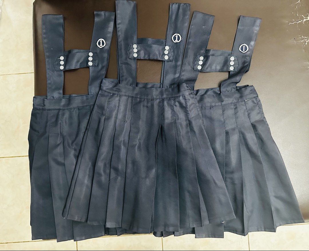 St. Scholasticas Academy Uniform set (Category: Everything Else Others) located in San Fernando. Submitted by wise_royaldragon.605ce7 (Listing ID 1464361389, Image 1). Description: - Set of school uniforms - Includes dark blue pleated pinafore skirts with adjustable straps - Includes white short-sleeved blouses with Peter Pan collars - Multiple sets available - Great for students - Please check photos for details.