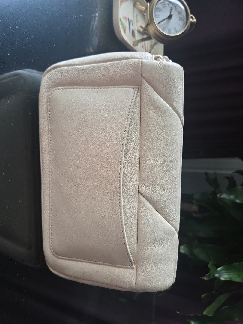 Staccato Quilted Chain Shoulder Bag Cream (Category: Shoulder Bags) located in San Juan City. Submitted by wisedolphin_5a645c (Listing ID 1464375868, Image 2). Description: - Brand: Staccato - Color: Cream - Style: Quilted Shoulder Bag - Exterior Features: Front pocket, chain strap - Interior Features: Zippered pocket, slip pocket - Closure: Magnetic snap - Condition: Clean inside and out rfs: decluttering coz barely used P900 location: san juan,