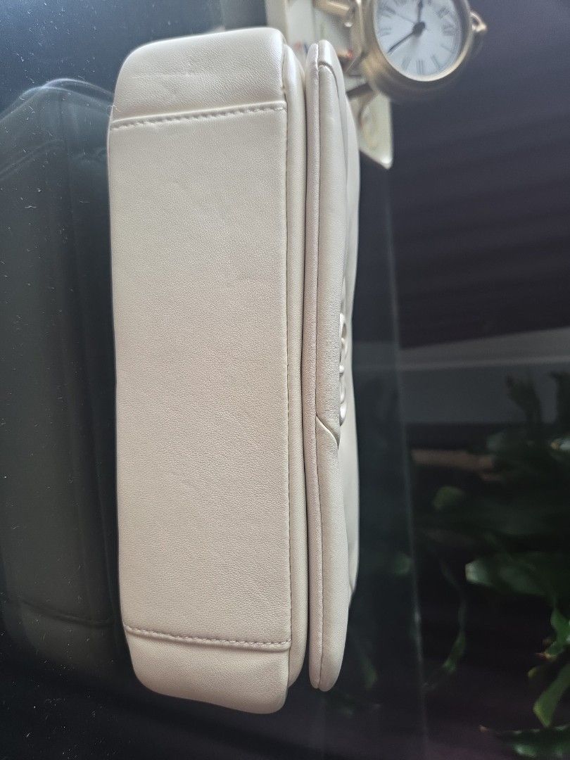 Staccato Quilted Chain Shoulder Bag Cream (Category: Shoulder Bags) located in San Juan City. Submitted by wisedolphin_5a645c (Listing ID 1464375868, Image 3). Description: - Brand: Staccato - Color: Cream - Style: Quilted Shoulder Bag - Exterior Features: Front pocket, chain strap - Interior Features: Zippered pocket, slip pocket - Closure: Magnetic snap - Condition: Clean inside and out rfs: decluttering coz barely used P900 location: san juan,