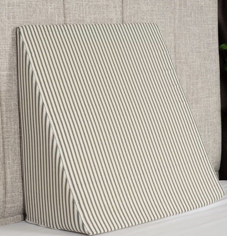 Striped Wedge Pillow for Back Support and Elevation (Category: Bedding & Towels) located in Manila. Submitted by jhie24 (Listing ID 1464368424, Image 2). Description: - Classic ticking stripe pattern - Perfect for propping yourself up in bed for reading or relaxing - Firm and supportive design - Removable cover for easy washing - Ideal for elevating legs or back.