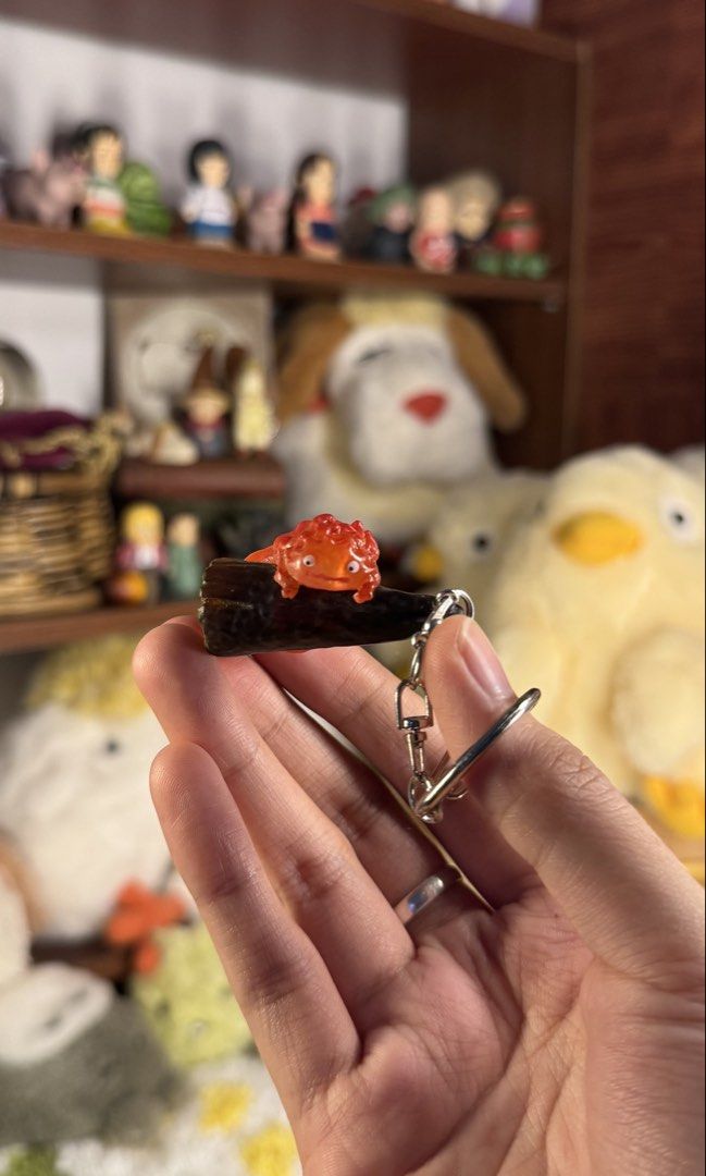 STUDIO GHIBLI - CALCIFER KEYCHAIN (Category: Charms) located in Tarlac. Submitted by chihiroshane (Listing ID 1464556821, Image 2). Description: calcifer keychains studio ghibli markings 4 pcs available ₱450 each.