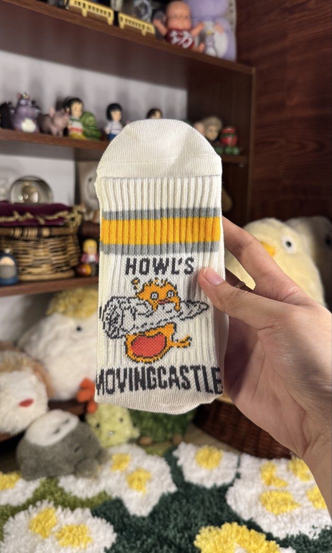 STUDIO GHIBLI - CALCIFER WHITE LONG SOCKS (Category: Socks & Tights) located in Tarlac. Submitted by chihiroshane (Listing ID 1464556582, Image 1). Description: howl’s moving castle (calcifer) long socks.