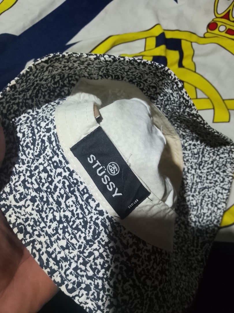 Stussy Bucket Hat - Black and White Pattern (Category: Caps & Hats) located in Bantayan. Submitted by markjimenez1975557 (Listing ID 1464496245, Image 3). Description: - Classic Stussy bucket hat - Black and white speckled pattern all over - Embroidered Stussy logo on the front - Ideal for sunny days or adding style to your outfit - Please check photos for detailed condition.