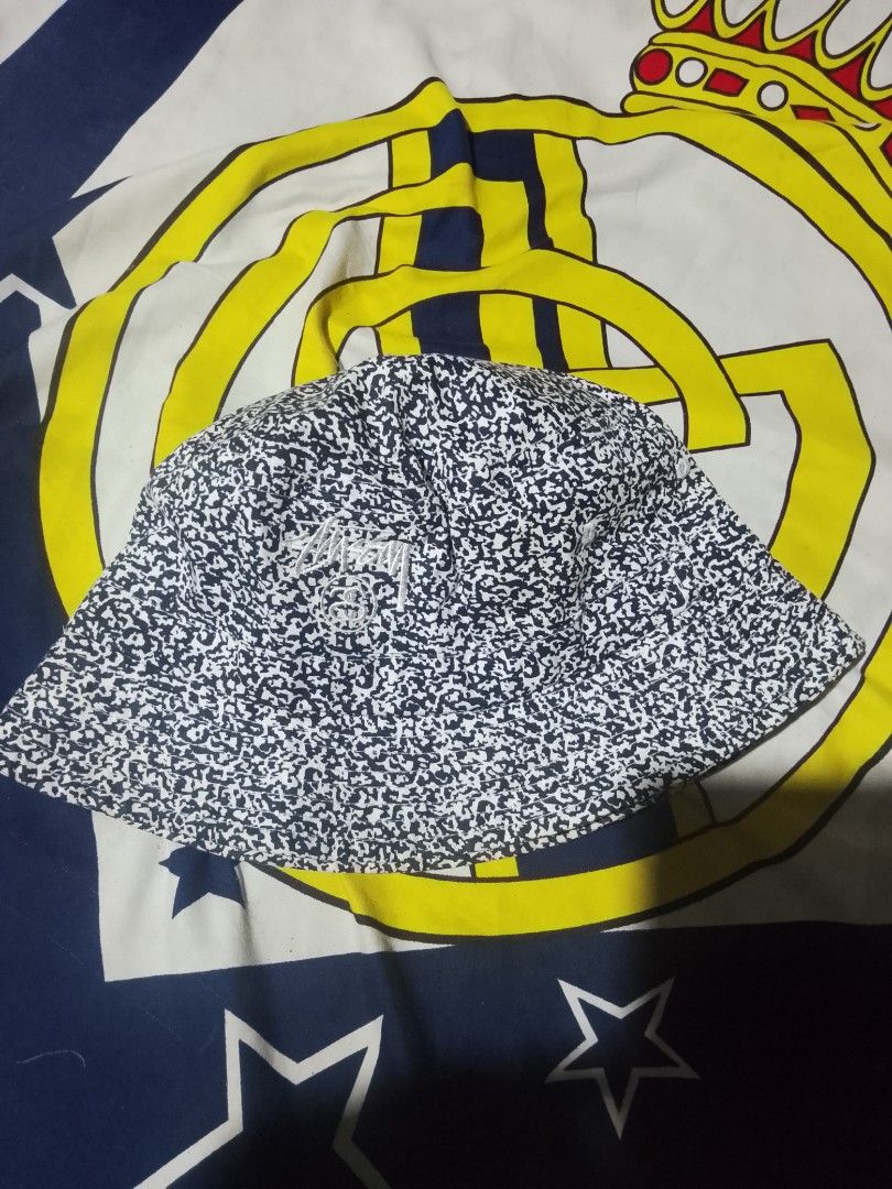 Stussy Bucket Hat - Black and White Pattern (Category: Caps & Hats) located in Bantayan. Submitted by markjimenez1975557 (Listing ID 1464496245, Image 1). Description: - Classic Stussy bucket hat - Black and white speckled pattern all over - Embroidered Stussy logo on the front - Ideal for sunny days or adding style to your outfit - Please check photos for detailed condition.