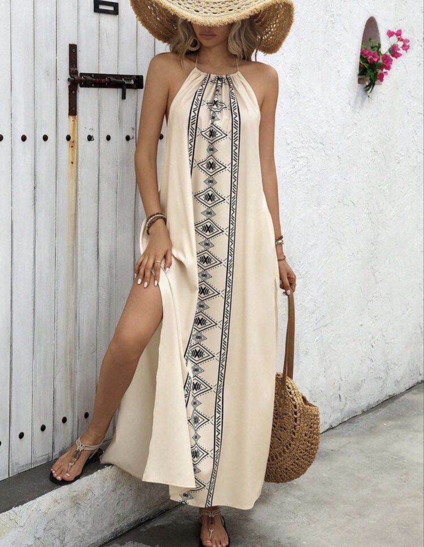 Summer High Slit Backless Neck Tie Dress (Category: Dresses) located in Manila. Submitted by adamaezing (Listing ID 1464392487, Image 2). Description: - Brand: Shein - Size: XS (EU 34/UK 6/US 2) - Condition: Used once, like new - Style: Summer maxi dress - Features: High slit, backless design, neck tie closure - Design: Geometric print detail - Perfect for: Vacations, beach, summer events.