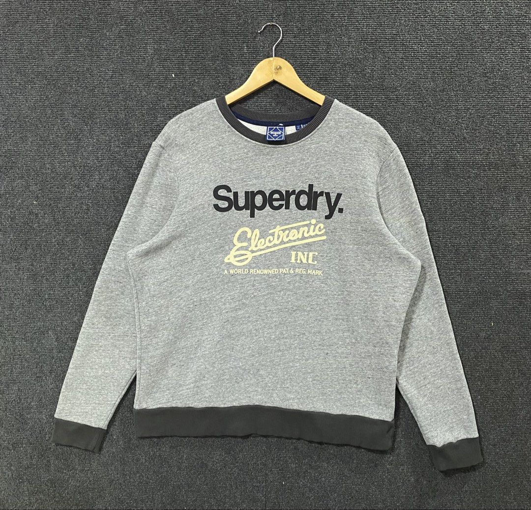 Superdry Electronic Inc sweatshirt crew neckline (Category: Coats, Jackets and Outerwear) located in Pozorrubio. Submitted by thrifttownph (Listing ID 1464381383, Image 1). Description: Superdry Electronic Inc sweatshirt crew neckline Size:Large Dimes:25x28 No issues Color rate:9:8/10 Good condition.