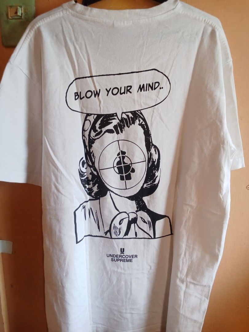 Supreme Public Enemy T-Shirt White Size M (Category: Tshirts & Polo Shirts ) located in Bacolod City. Submitted by vaststar.8be4bd (Listing ID 1464429451, Image 2). Description: - Supreme x Public Enemy Collaboration T-Shirt - Color: White - Graphic: Public Enemy logo on front, 'Blow Your Mind' on back - Material: 100% Pre-shrunk Cotton - Origin: Made in USA - Ideal for collectors and fans of Supreme and Public Enemy.