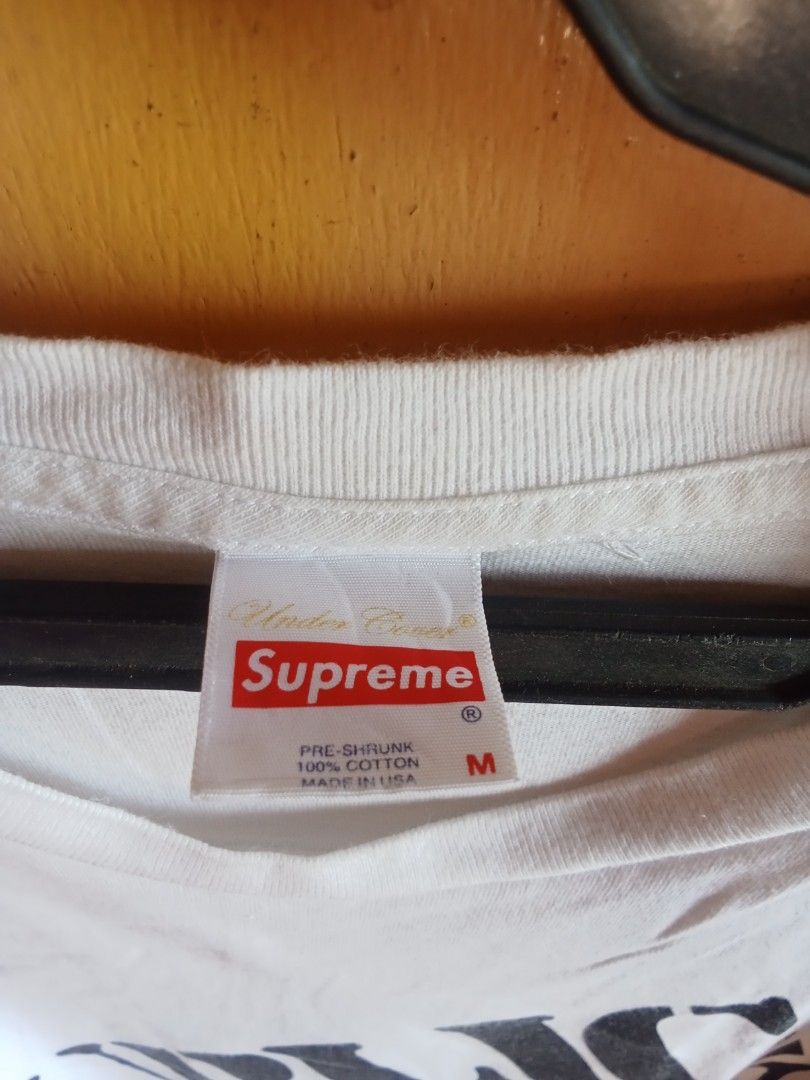 Supreme Public Enemy T-Shirt White Size M (Category: Tshirts & Polo Shirts ) located in Bacolod City. Submitted by vaststar.8be4bd (Listing ID 1464429451, Image 3). Description: - Supreme x Public Enemy Collaboration T-Shirt - Color: White - Graphic: Public Enemy logo on front, 'Blow Your Mind' on back - Material: 100% Pre-shrunk Cotton - Origin: Made in USA - Ideal for collectors and fans of Supreme and Public Enemy.