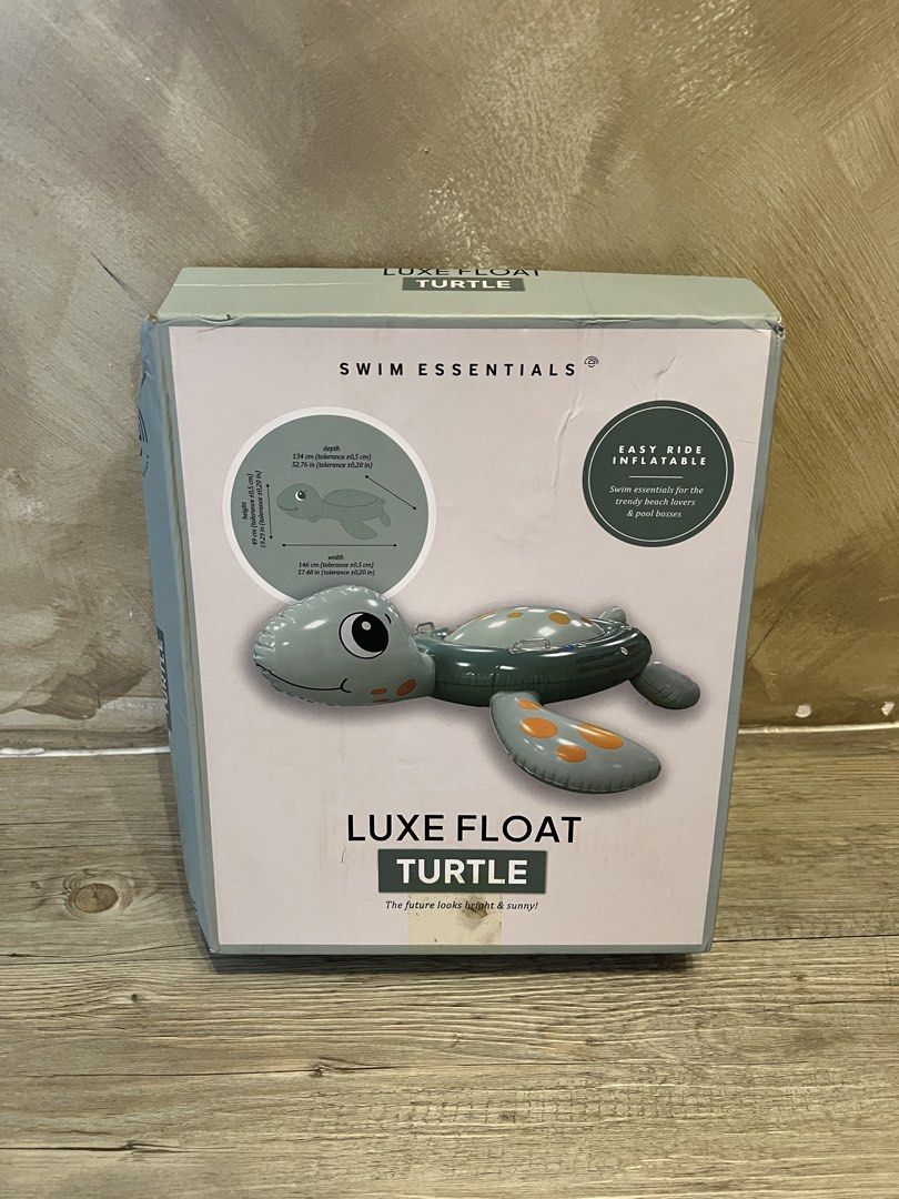 Swim Essentials Luxe Float Turtle Pool Float (Category: Water Sports) located in Singapore. Submitted by authentict (Listing ID 1464407718, Image 3). Description: - Fun turtle-shaped pool float - Suitable for both kids and adults - Easy to inflate and use - Made from durable material - Ideal for summer fun Brand new (Sealed) Dimension on last Pic No nego. For courier please click Buy!.