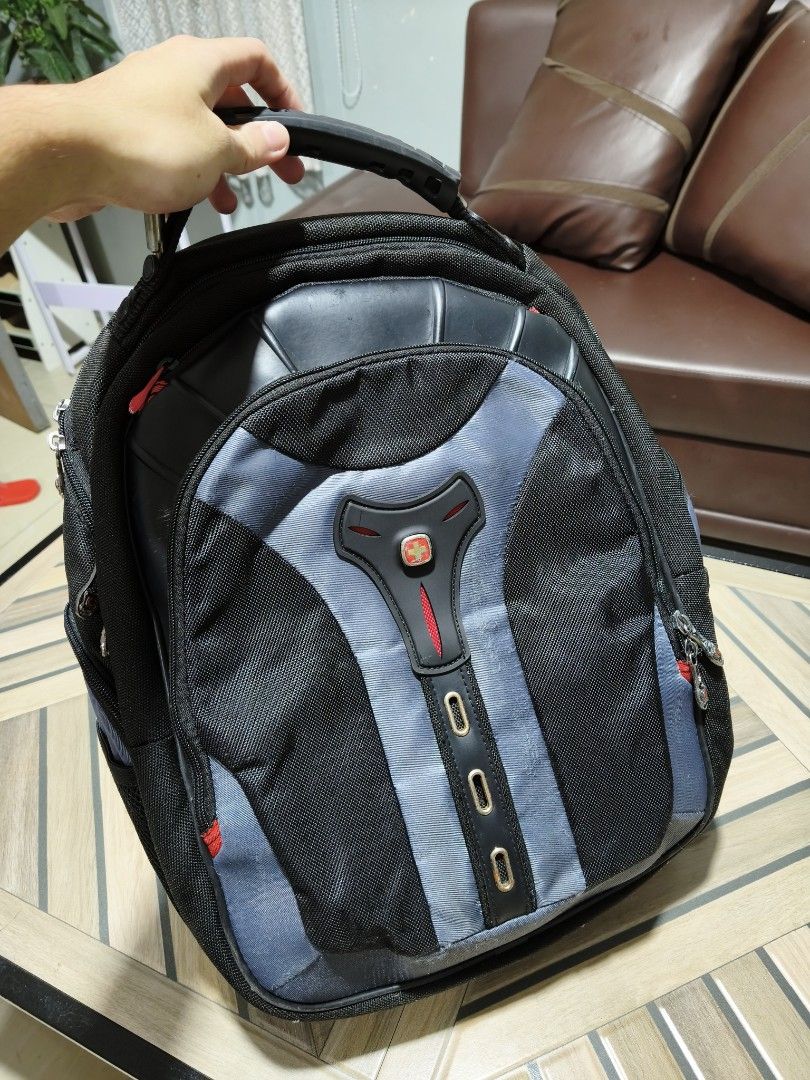 Swiss Gear Backpack - Black & Grey Bag (Category: Backpacks) located in Manila. Submitted by paul.c29cruz (Listing ID 1464447475, Image 1). Description: - Durable black and grey backpack - Multiple zippered compartments for easy organization - Padded straps for maximum comfort - Ample space inside for all your essentials - Ideal for travel or everyday use - All zippers are intact and fully functional Price - 999 100% Original! Saglit lang nagamit