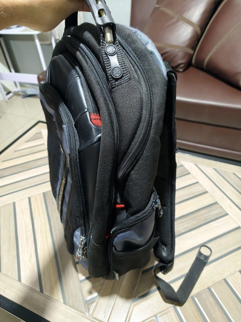 Swiss Gear Backpack - Black & Grey Bag (Category: Backpacks) located in Manila. Submitted by paul.c29cruz (Listing ID 1464447475, Image 2). Description: - Durable black and grey backpack - Multiple zippered compartments for easy organization - Padded straps for maximum comfort - Ample space inside for all your essentials - Ideal for travel or everyday use - All zippers are intact and fully functional Price - 999 100% Original! Saglit lang nagamit