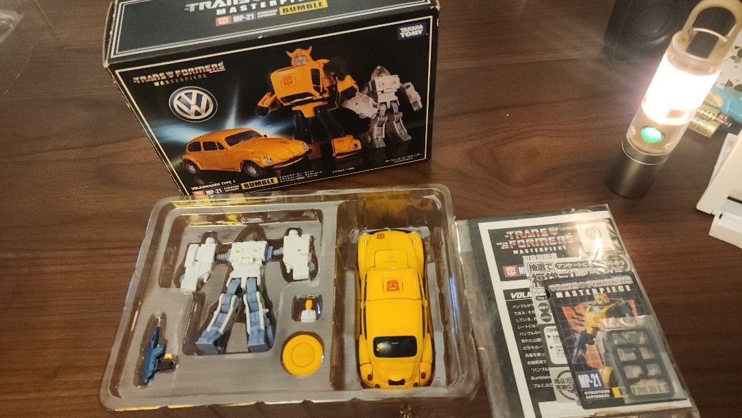 Takara Tomy Transformers Masterpiece MP-21 Bumblebee VW Type 1 Authentic (Category: Vehicle & Diecast Models) located in Taguig. Submitted by RJR888 (Listing ID 1464556576, Image 1). Description: Authentic Item! - Takara Tomy Transformers Masterpiece MP-21 Bumblebee - Features the iconic Volkswagen Type 1 Beetle alt mode - Transforms from a classic VW Beetle into the Autobot Bumblebee - All original accessories are included - Comes in original pa