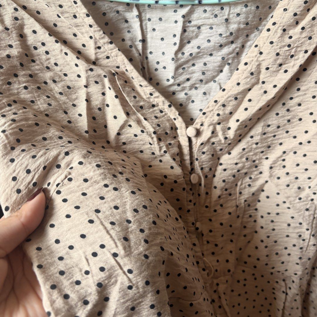 Take all Anko Tops (Category: Blouses) located in Makati City. Submitted by iu__00 (Listing ID 1464391720, Image 3). Description: - Beige blouse with classic black polka dots - Size: Medium to Large - Short sleeves for a comfortable fit - Flattering V-neckline with functional button-up front - Stylish peplum hem detail adds a feminine touch - Made from lightweight fabric, perfect for all-day wear - Ideal for both casual outings and dressing up fo