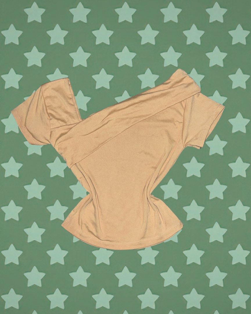 Tan Off-Shoulder Top (Category: Blouses) located in Tuguegarao City. Submitted by love_clothies (Listing ID 1464522733, Image 1). Description: - Tan off-shoulder top - Short sleeves - Stretchy material for comfort - Ideal for casual wear - Easy to style with jeans or skirts - A wardrobe essential - Can fit to Small to Medium, but best fit to Small.