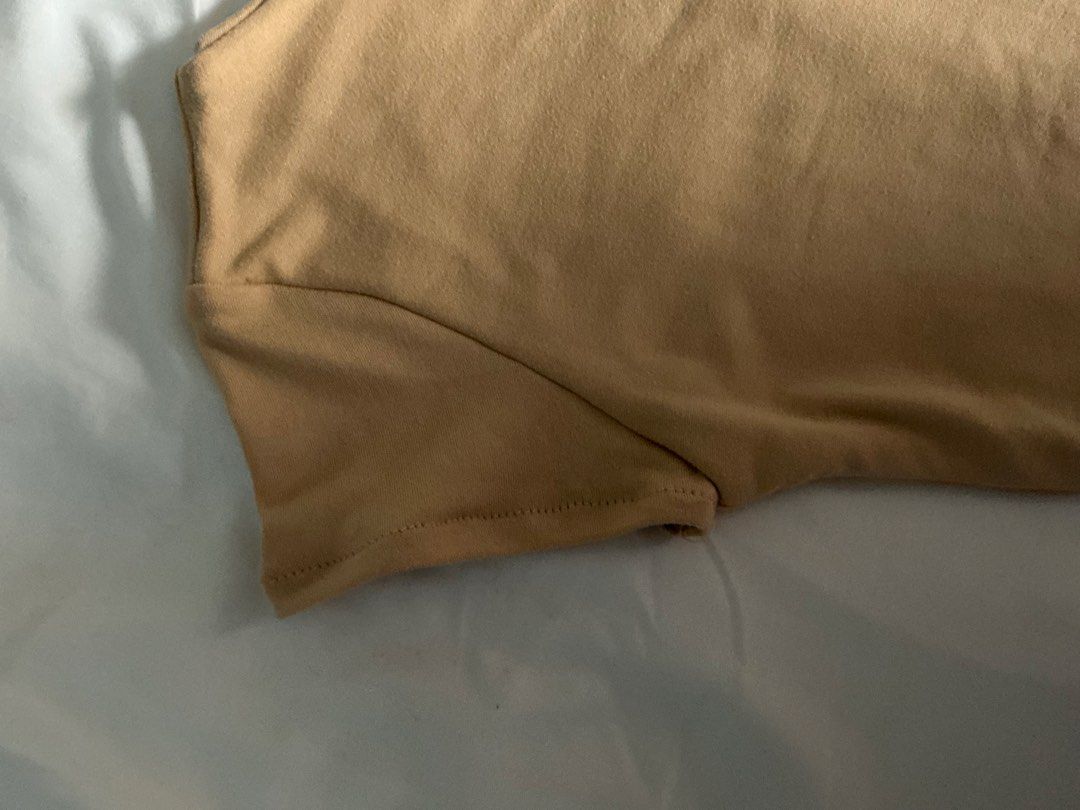 Tan Short Sleeve Double Lining Shirt (Category: Shirts) located in Manila. Submitted by isomarizm (Listing ID 1464402145, Image 2). Description: - Basic tan short sleeve t-shirt - Can fit xxs-xs -Double lining -Cotton spandex fabric loc: qc/malabon mop: gcash/maya.