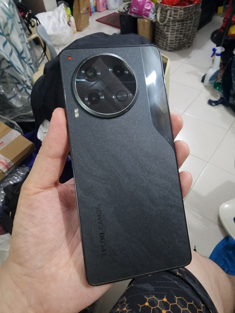 Tecno Camon 30 5G 256GB 8GB Ram Black (Category: Other Mobile & Gadget Accessories) located in Quezon City. Submitted by Mr.Skyler (Listing ID 1464566161, Image 1). Description: 📱 TECNO CAMON 30 5G 🔥 💰 PRICE: ₱5,999 ONLY‼️ 💾 8GB RAM + 8GB Extended RAM 📦 256GB ROM 📶 5G Connectivity ⚡ MediaTek Dimensity 7020 5G 📱 6.78" AMOLED 120Hz Display 📸 50MP OIS Main Camera 🤳 50MP Front Camera 🔋 5000mAh Battery ⚡ 70W Fast Charging 🔊 Stereo Speakers 