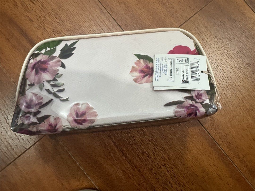 Ted Baker Violet & Bergamot Body Care Gift Set (Category: Body Care) located in Makati City. Submitted by brandeditems4sale (Listing ID 1464449786, Image 2). Description: - Ted Baker Violet & Bergamot Gift Set - Includes: Body Wash, Body Spray, Hand Cream (all 1.7 fl oz) - Features a beautiful floral print cosmetic bag - Bag has a secure zip closure - Ideal for gifting or personal indulgence.